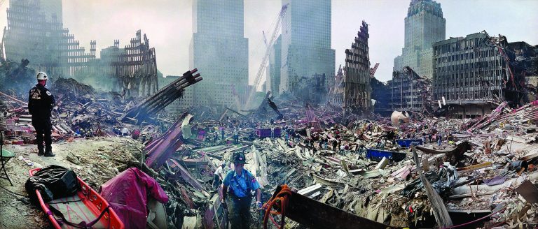 FILE - In this Monday, Sept. 24, 2001 file photo, rescue workers examine the site of the Sept. 11, 2001 World Trade Center terrorist attacks in New York. The most comprehensive study of potential World Trade Center-related cancers raises more questions than it answers and won't end a debate over whether the attacks were really a cause. (AP Photo/Ted S. Warren, Pool, File)