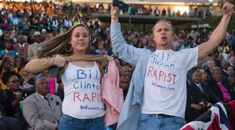 A radio contest that has participants jumping in front of news cameras to accuse former President Bill Clinton of being a rapist is starting to wear on the Democratic nominee's team. (from Twitter account @roycan79)