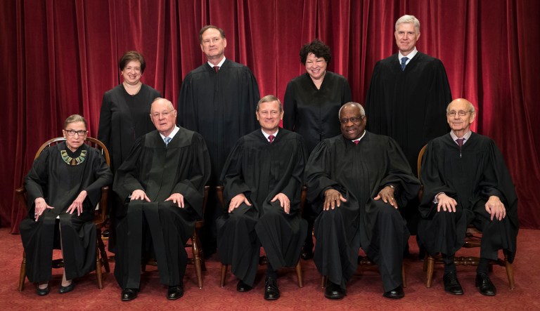 Recently at the Law Library of Congress, Supreme Court Justice Clarence Thomas (pictured front, fourth to the right) said he regretted the 