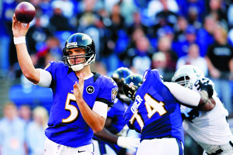 Rob Carr/Getty Images
Baltimore Ravens quarterback Joe Flacco threw for 341 yards and three touchdowns to help beat the Oakland Raiders.