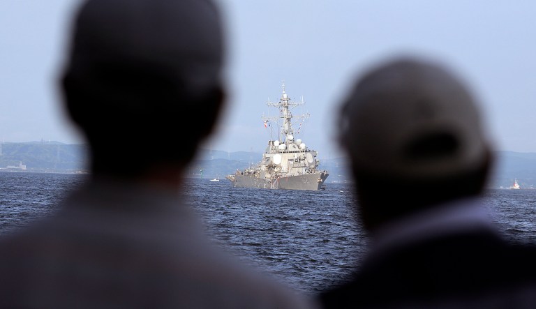 The sailor, who was a crew member on the guided-missile destroyer USS Stethem, will not be identified until after next of kin are notified. (AP Photo/Eugene Hoshiko)