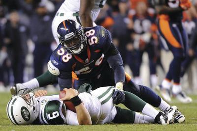 Broncos get defensive around Tebow