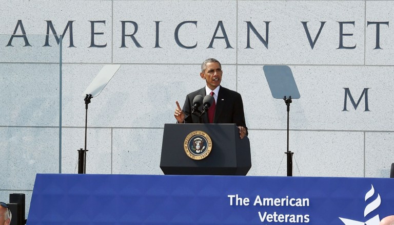 President Obama speaks during the dedication ceremony for the American Veterans Disabled for Life Memorial in Washington, Sunday, Oct. 5, 2014. (AP Photo/Molly Riley)