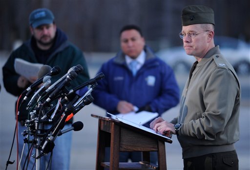Col. David W. Maxwell holds a press conference at the Marine Corps Museum in Quantico regarding a murder/suicide that occurred on Thursday night that resulted in the deaths of three Marines. A Marine killed a male and female colleague in a shooting at a base in northern Virginia before killing himself, officials said early Friday. (AP Photo/The Free Lance-Star, Peter Cihelka)