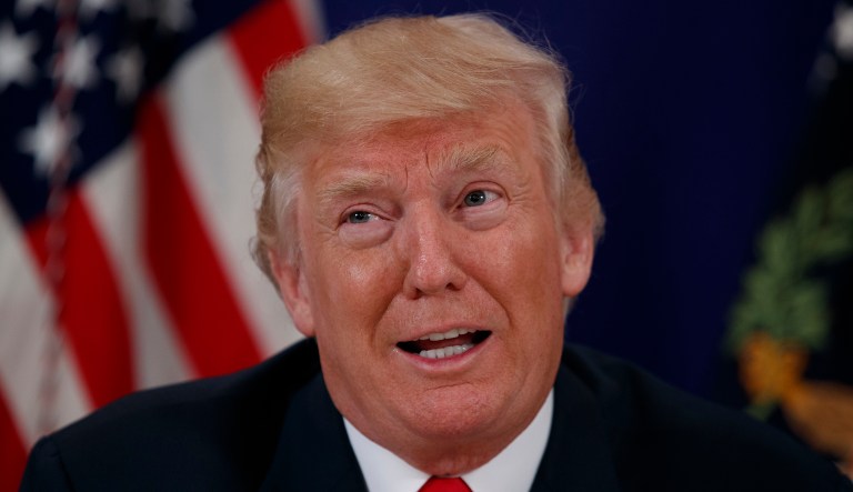 The diplomats and staff were expelled in response to a bill passed by Congress and signed by Trump that imposed new sanctions on Russia. (AP Photo/Evan Vucci)