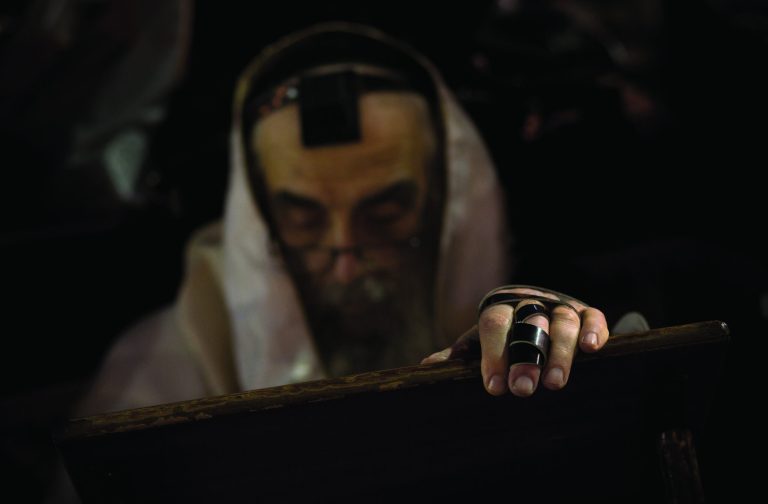 An Ultra-Orthodox Jew prays at the Western Wall in Jerusalem's Old City, before the start the holiday of Rosh Hashana, early Sunday, Sept. 16, 2012. Jews will mark the holiday of Rosh Hashana, or the Jewish New Year at sundown Sunday. (AP Photo/Bernat Armangue)