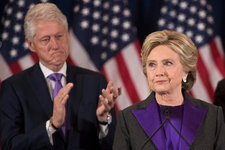 Former President Bill Clinton applauds as his wife, Democratic presidential candidate Hillary Clinton speaks in New York, Wednesday, Nov. 9, 2016, where she conceded her defeat to Republican Donald Trump after the hard-fought presidential election. (AP Photo/Matt Rourke)