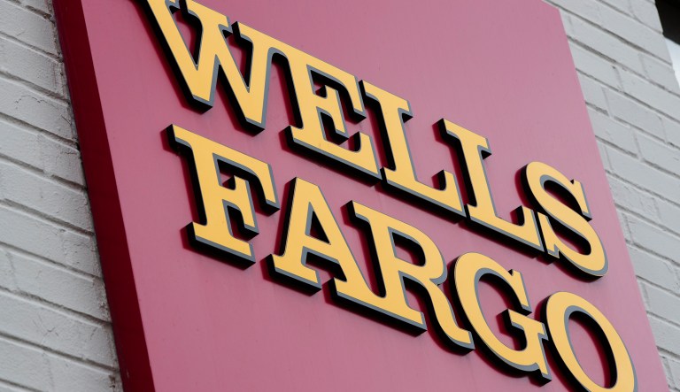 The head of an influential industry group for community banks called on federal regulators Wednesday to remove Wells Fargo's board of directors and senior executives for allowing a massive fake accounts scandal to unfold on their watch. (AP Photo/Matt Rourke)