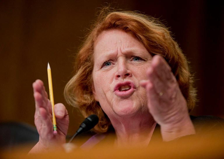 The ad blast is meant to incentivize moderate Democratic Sen. Heidi Heitkamp of North Dakota and Joe Manchin of West Virginia (not shown) into following constituents who oppose confirming Obama's Supreme Court nominee. (AP Photo/Manuel Balce Ceneta)