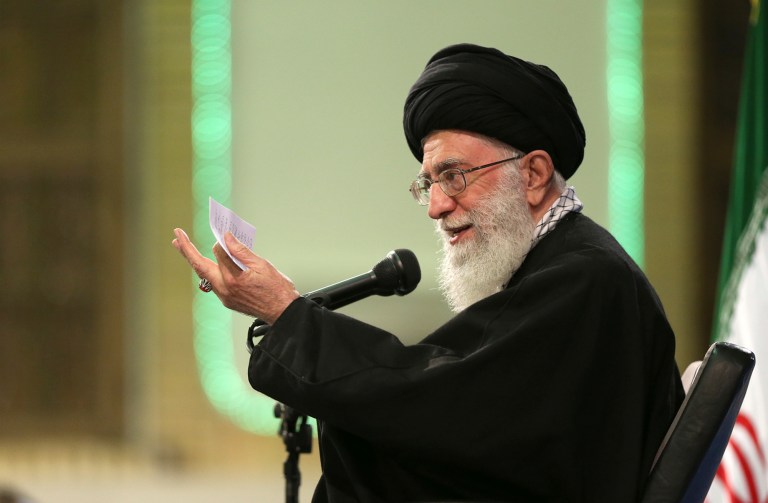 In this picture released by the official website of the office of the Iranian supreme leader, Supreme Leader Ayatollah Ali Khamenei delivers his speech in a meeting with a group of religious performers in Tehran, Iran, Thursday, April 9, 2015. Iran's top leader on Thursday stopped short of giving his endorsement to the framework nuclear deal struck last week between Tehran and world powers, while the country's president warned separately that Tehran's approval of a final deal depends on the immediate lifting of all sanctions related to its controversial nuclear program. (AP Photo/Office of the Iranian Supreme Leader)