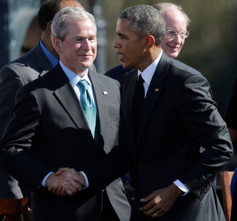 President Obama shakes hands with Former President George W. Bush after Obama spoke to a large crowd on the anniversary of Bloody Sunday in Selma, Ala. (AP)