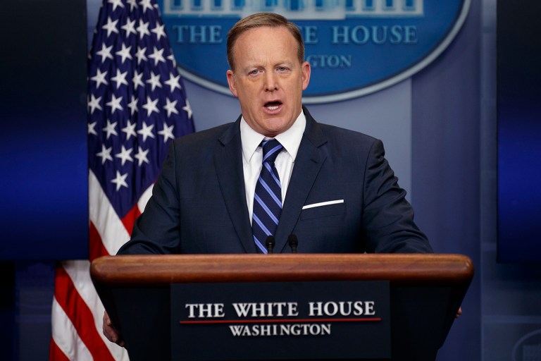 White House press secretary Sean Spicer declined to say whether he believes President Trump's claim that the Obama administration wiretapped members of his campaign just before the election. (AP Photo/Evan Vucci)
