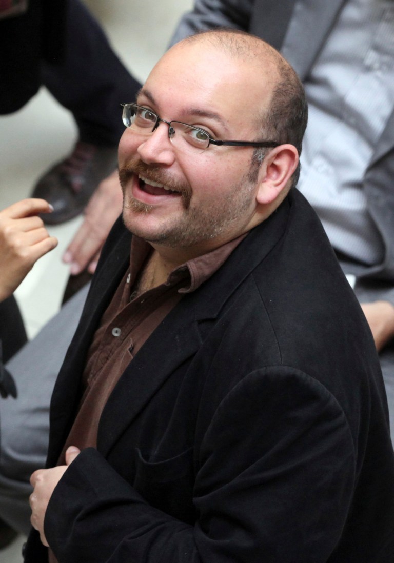 In this photo April 11, 2013 file photo, Jason Rezaian, an Iranian-American correspondent for the Washington Post smiles as he attends a presidential campaign of President Hassan Rouhani in Tehran, Iran. (AP Photo/Vahid Salemi, File)
