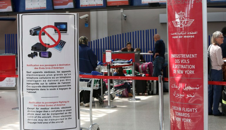 The U.S. is barring passengers on some international flights from mostly Middle Eastern and North African countries from bringing laptops, tablets, electronic games and other devices on board in carry-on bags. (AP Photo/ Abdeljalil Bounhar)