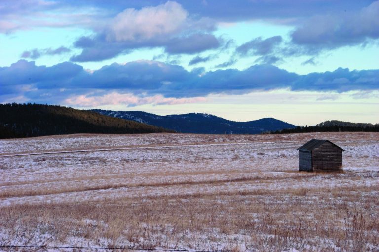 This 2007 photo provided by South Dakota Magazine shows Reynolds Prairie in the Black Hills of South Dakota. Nearly 2,000 acres of the ranch, which encompasses a sacred site known as Pe Sla to a band of Native American tribes that once lived in the Black Hills, is going up for auction on Aug. 25, 2012. Now the tribes, collectively known as the Sioux, are coming together to raise money to buy back the only sacred site currently located on privately-owned land. (AP Photo/courtesy South Dakota Magazine, Bernie Hunhoff)