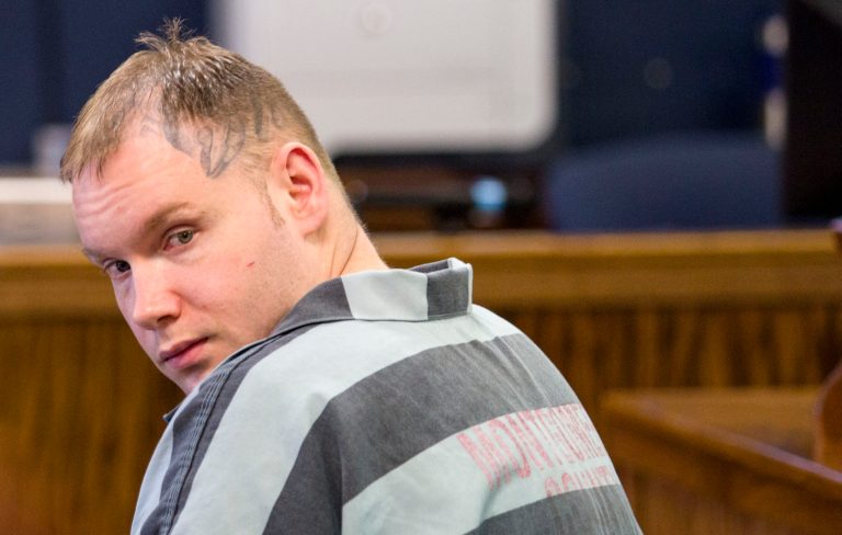 FILE - In this March, 3, 2014 file photo, Don Willburn Collins sits during a hearing petition at the 359th Judicial District Court with Judge Kathleen Hamilton, in Conroe, Texas.  A judge has granted a request to move the trial of Collins, who is facing a capital murder charge in a childhood attack on a boy who died nearly 13 years later. Authorities say Collins was 13 when he poured gasoline on Robert Middleton and set him on fire during Middleton's eighth birthday in 1998. (AP Photo/Conroe Courier, Ana Ramirez, File)