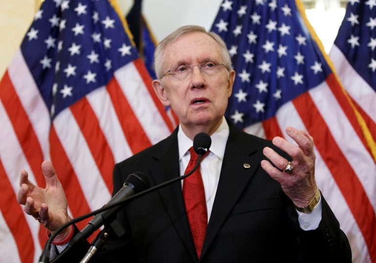 Senate Majority Leader Harry Reid of Nev., once a Nevada Gaming Commission official, joins boxing executives during a news conference on Capitol Hill in Washington, Tuesday, Feb. 4, 2014, to support a study by professional fighters about brain damage and trauma suffered by boxers.  (AP Photo/J. Scott Applewhite)