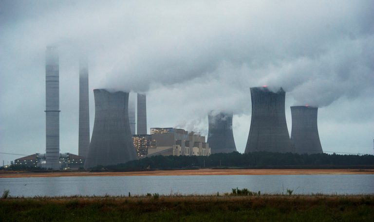 The coal-fired Plant Scherer is shown in operation early Sunday in Juliette, Ga. (AP/John Amis)