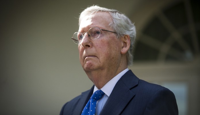 Senate Majority Leader Mitch McConnell says if allegations of Alabama Senate candidate Roy Moore pursuing 14-year-old are true, "he must step aside." (Al Drago/Bloomberg)