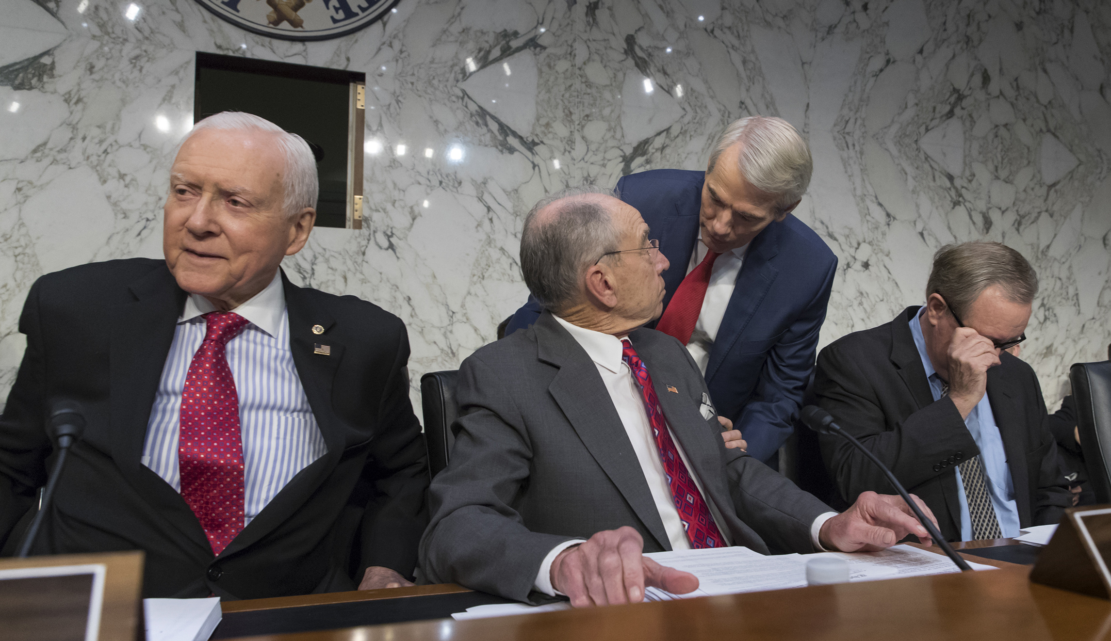 Finance committee halts work to fix Senate tax bill’s budget problems