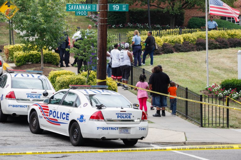 Police investigate a shooting Monday in Southeast D.C. (Graeme Jennings/Examiner)