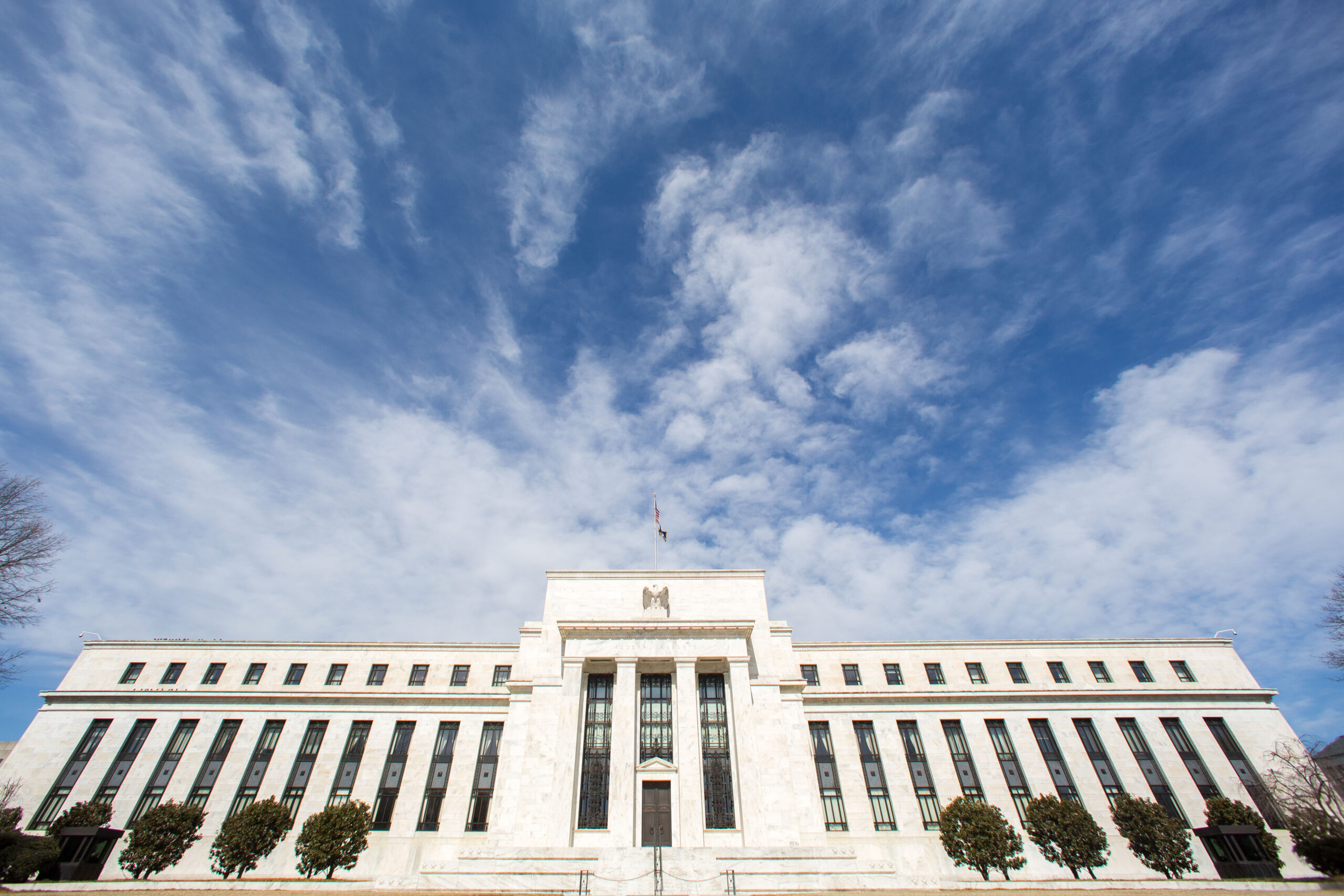 Fed sees October end for monthly bond buying