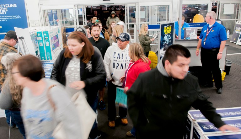Shoppers enter a Best Buy looking for early Black Friday deals on Thanksgiving Day, Thursday, Nov. 23, 2017, in Bowling Green, Ky. (Bac Totrong/Daily News via AP)