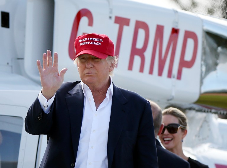Presidential contender Donald Trump arrives by helicopter during the 1st first day of the Women's British Open golf championship on the Turnberry golf course in Turnberry, Scotland, Thursday, July 30, 2015. (AP Photo/Scott Heppell)