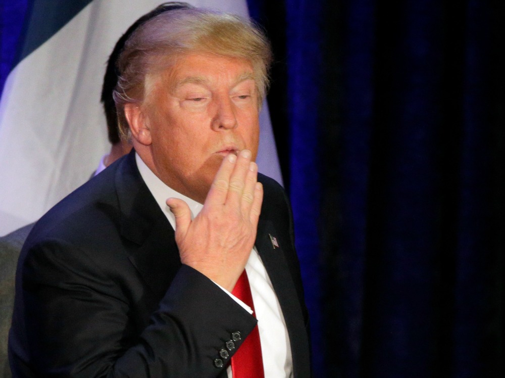 Trump’s media allies downplay Iowa loss