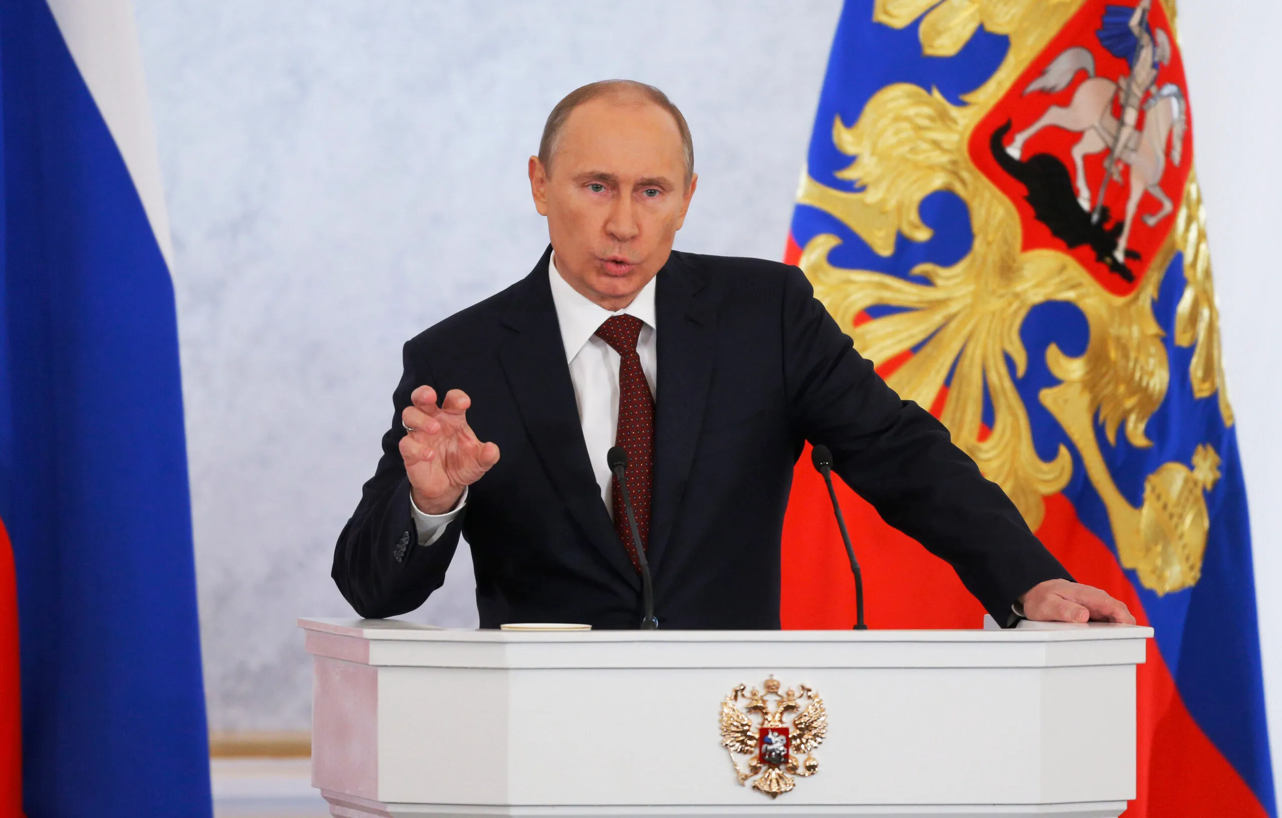 Putin rejects foreign advice on democracy