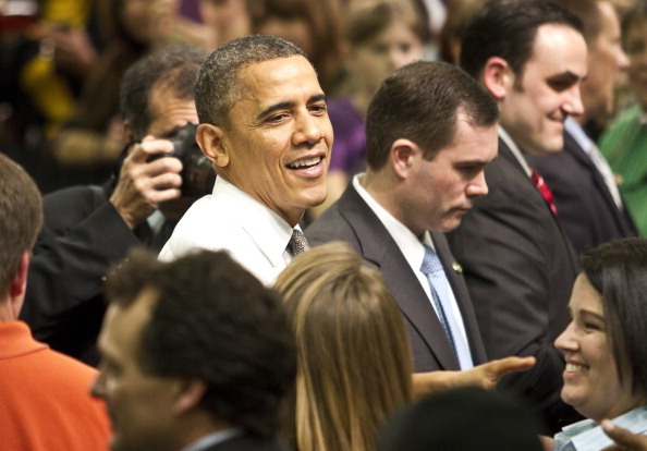 ARDEN, NC  - FEBRUARY 13: U.S. President Barack Obama shakes hands with supporters after delivering remarks on the economy at Linamar Corporation on February 13, 2013 in Arden, North Carolina.  President Obama delivered the remarks at the North Carolina auto components manufacturing plant following his State of the Union speech on Tuesday.  (Photo by John W. Adkisson/Getty Images)