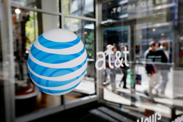 Second quarter filings with the Securities and Exchange Commission indicated that AT&T's capital expenditures were down 29 percent for the first half of 2015 compared to the same period last year. (AP Photo/Matt Rourke)
