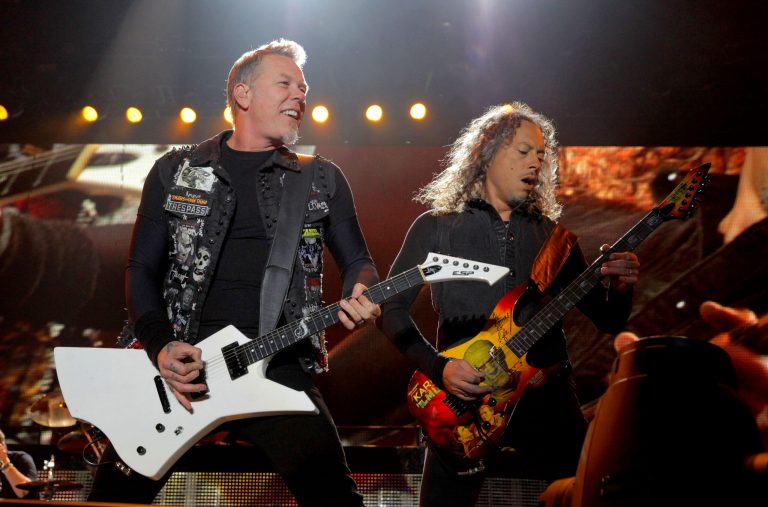   FILE - This Oct. 27, 2012 file photo shows James Hetfield, left, and Kirk Hammett of Metallica performing at the Voodoo Music Experience in New Orleans. All music spanning Metallicaâs 30-year history is now available on Spotify. The company announced the move Thursday, Dec. 6, during a presentation to debut new features in New York. Metallica had previously refused to stream its music. (Photo by Barry Brecheisen/Invision/AP, file)  