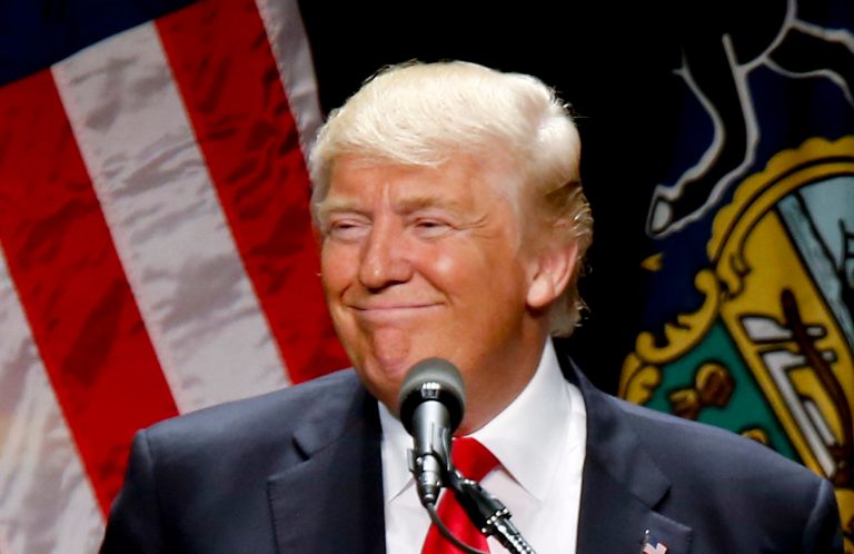 Sean Hannity asked Donald Trump if he was holding his cards close to his vest. (AP Photo/Keith Srakocic)