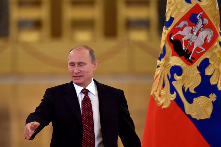 Russian President Vladimir Putin arrives prior to heading the Human Rights Council in Moscow's Kremlin, Russia, Tuesday, Oct. 14, 2014. (AP Photo/Kirill Kydryavtsev, Pool)