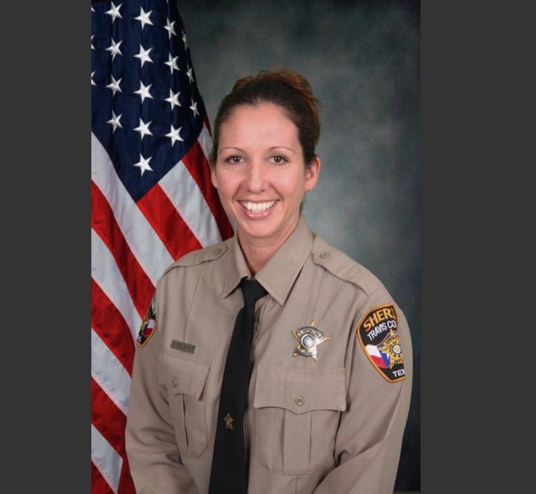 This undated photo provided by the Travis County Sheriff's Office on Friday, Sept. 19, 2014 shows Senior Deputy Jessica Hollis. On Friday, officials said her body was found after she was swept into Lake Austin when heavy rains flooded parts of Central Texas early Thursday. She was patrolling low water crossings looking for people in danger, according to a spokesman with the sheriff's office. (AP Photo/Travis County Sheriff's Office)