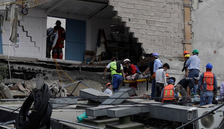 The earthquake hit Mexico City on the anniversary of an 8.0 magnitude quake in 1985 and has left at least 42 people dead. (AP Photo/Rebecca Blackwell)