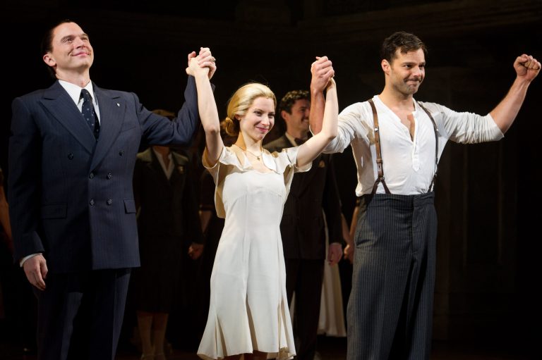   FILE - This March 12, 2012 file photo shows actors, from left, Michael Cerveris, Elena Roger and Ricky Martin at the curtain call after their first performance in the new Broadway production of 