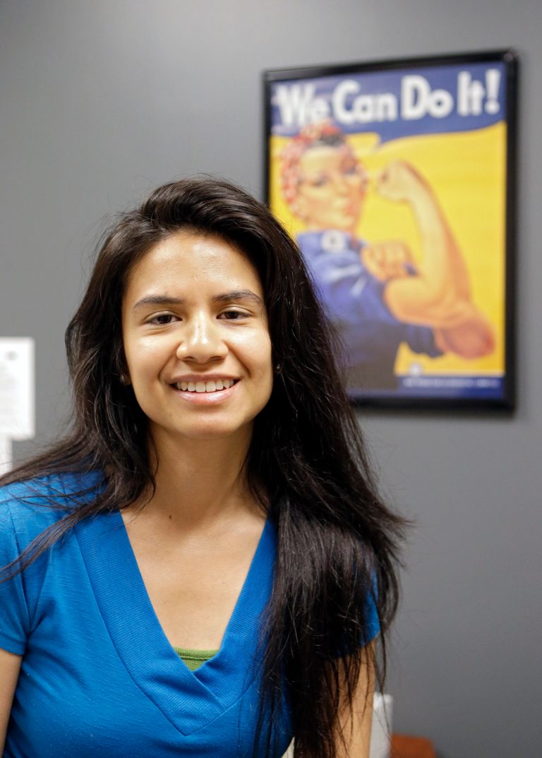 Army veteran Charlene Jorge poses in her office at the Cuyahoga County Veterans Service Commission in Cleveland Thursday, July 10, 2014. Veterans who served at the time of the Iraq war only have a few months left to claim Ohio bonuses of up to $1,500, and state officials are expanding efforts to get the word out to potentially thousands of veterans who may miss out by not applying. Jorge, who served in Iraq, applied early for her bonus, said she used the $1,300 she received for bills and other necessities. (AP Photo/Mark Duncan)