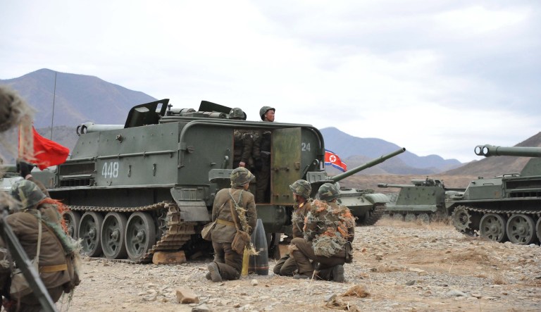 North Korean soldiers prepare shells during a live-fire exercise near North Korea's southwest coast. (AP Photo)