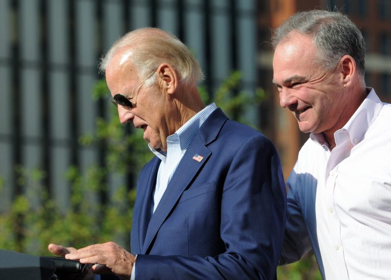 Vice President Joe Biden received a warm send-off at a frigid outdoor rally in Northern Virginia for Democratic VP nominee Tim Kaine. (AP Photo/John Heller)