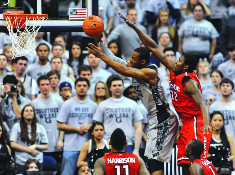 Richard Lipski/AP
Jabril Trawick finished with 12 points, five rebounds and four assists as Georgetown beat St. John's on Saturday.