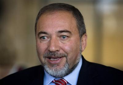 Israeli Foreign Minister Avigdor Lieberman speaks to journalists following a meeting of the Foreign Affairs and Defense Committee, in the Knesset, Israel's parliament in Jerusalem, Monday, Nov. 14, 2011. Lieberman said Monday the United Nations atomic agency report accusing Iran of developing nuclear arms is