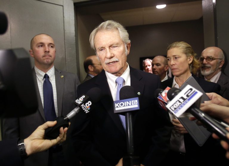 Oregon Democratic Gov. John Kitzhaber makes a statement before his gubernatorial debate with Republican challenger Dennis Richardson in Portland, Ore., Friday, Oct. 10, 2014. This is Kitzhaber's first public appearance since Thursday's admission by his fiance, Cylvia Hayes, to violating the law in 1997 when she married an immigrant seeking to retain residency in the United States. (AP Photo/Don Ryan)