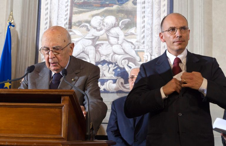 Italian premier-designate Enrico Letta, right, and Italian President Giorgio Napolitano meet the media at the Quirinale presidential palace, in Rome, Saturday, April 27, 2013. Italy has finally has a new government, a coalition of Berlusconi's forces and center-left rivals who forged an unusual alliance to break a two-month stalemate following inconclusive elections. Enrico Letta, a center-left leader, will be premier in the government, which marks the latest political comeback by Silvio Berlusconi. (AP Photo/Domenico Stinellis)