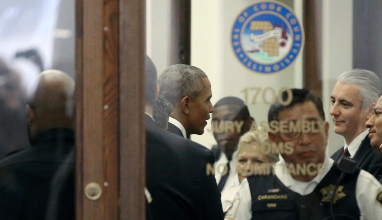 Former President Barack Obama arrives for jury duty in the Daley Center on Wednesday, Nov. 8, 2017, in Chicago. Obama is in line to be paid the same $17.20 a day that others receive for reporting for jury duty. (Kevin Tanaka/Sun Times via AP)