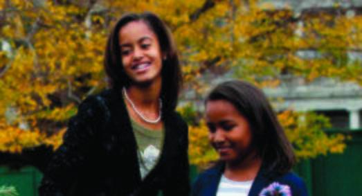 Malia Obama, left, with her sister Sasha. AP Photo.