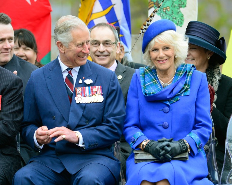 Prince Charles and his wife Camilla, the Duchess of Cornwall, smile during an event in Halifax, Nova Scotia on Monday, May 19, 2014.  Prince Charles and Camilla are visiting Nova Scotia, Prince Edward Island and Manitoba. (AP Photo/The Canadian Press, Paul Chiasson)