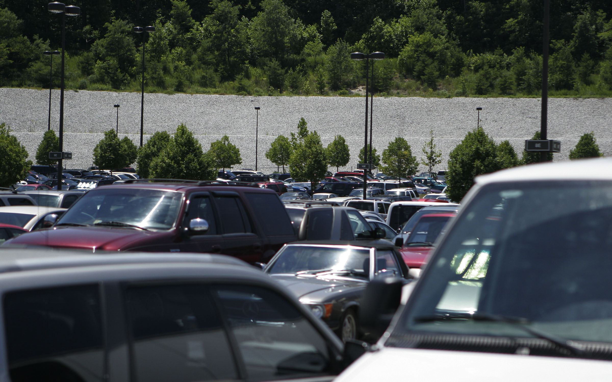 Metro plans to develop lots but keep parking spots