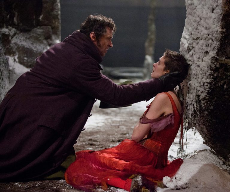   This film image released by Universal Pictures shows Hugh Jackman as Jean Valjean, left, and Anne Hathaway as Fantine in a scene from 